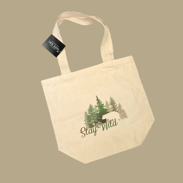 100% recycled tote bag with forest bear scene. Stay wild is written underneath.