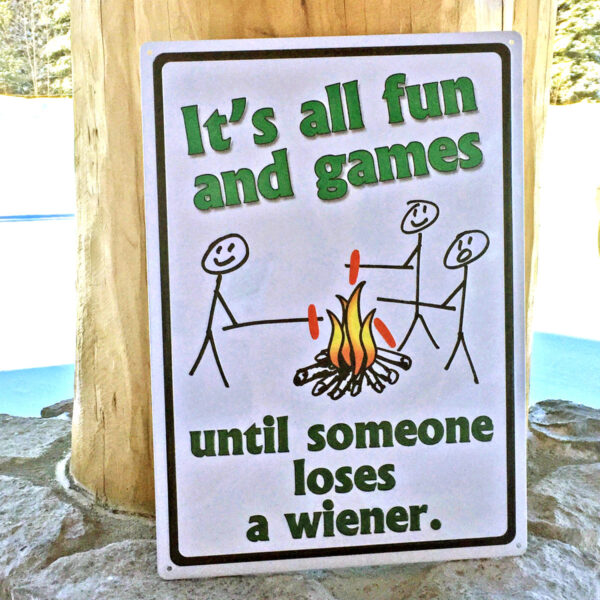 "It's all fun & games until someone loses a wiener" tin metal sign.