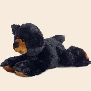 Little black bear laying down plush.
